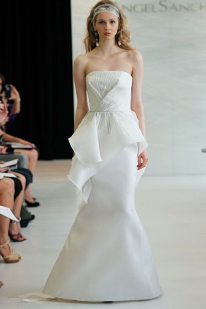 Peplum styled wedding dress with silver accents by Angel Sanchez